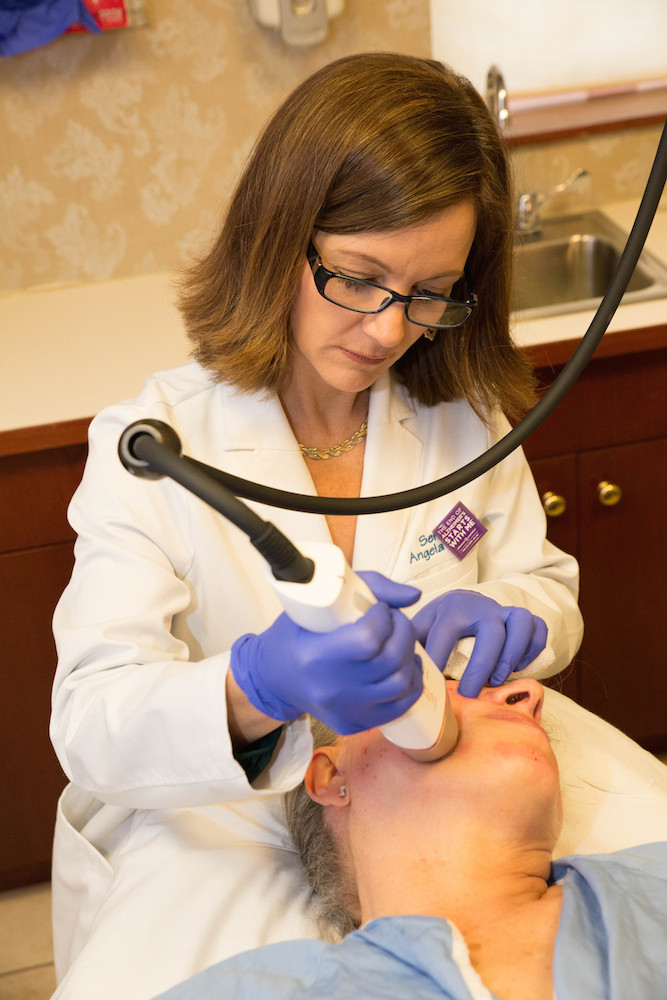 Parker Center Medi-Spa aesthetician administering INFINI microneedling treatment